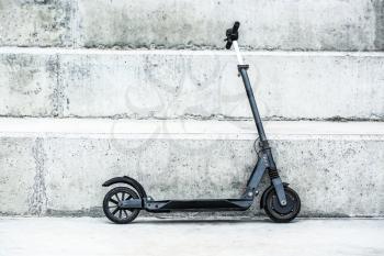 Modern electric kick scooter outdoors�