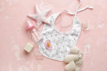 Baby accessories on color background�