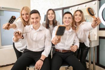 Young people during professional courses in hairdresser's salon�