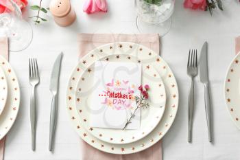 Table setting with card for Mother's day dinner�