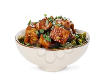 Bowl with tasty tofu cheese and vegetables on white background�
