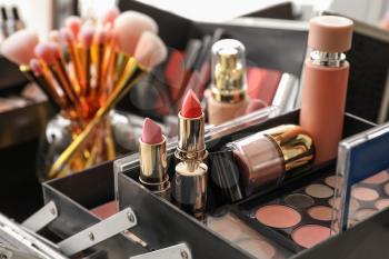 Case of professional makeup artist with decorative cosmetics, closeup�