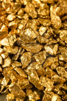 Many gold nuggets as background�