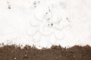 Scattered soil on light background�
