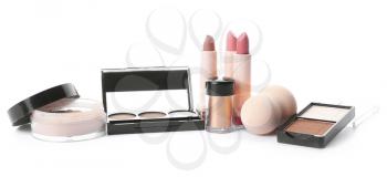 Different makeup cosmetics on white background�