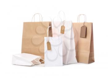 Paper shopping bags on white background�
