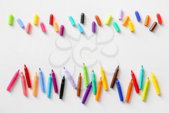 Colorful felt-tip pens on white background�