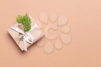 Beautiful Christmas gift on color background�