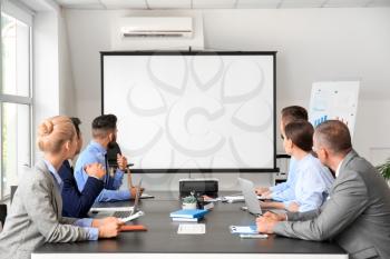 Business people having meeting in office�