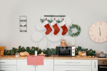Interior of modern kitchen decorated for Christmas�
