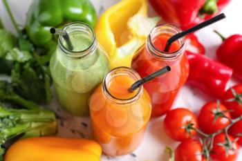 Composition with healthy smoothie and different vegetables, closeup�