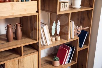 Modern shelf units with books and decor, closeup�