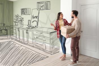 Happy couple imagining interior of new house on moving day�