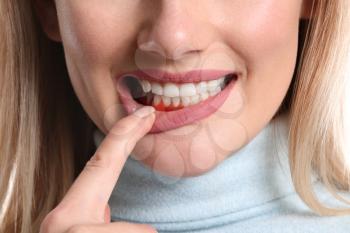 Woman with gum inflammation, closeup�