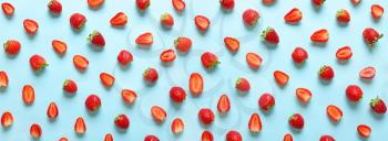 Many sweet ripe strawberry on color background�
