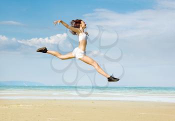 Royalty Free Photo of a Woman Leaping