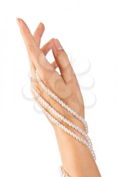 image of beautiful nails and woman fingers with pearls isolated on white