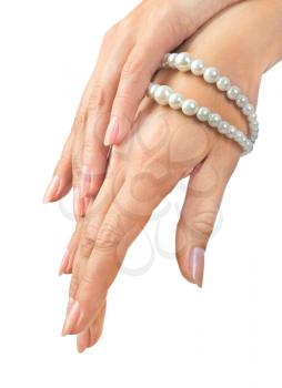 image of beautiful nails and woman fingers with pearls