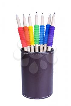 Several pencils with  tubes different colours isolated on white background