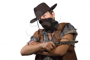 cowboy with revolver in his hand isolated on white background.Shallow DOF