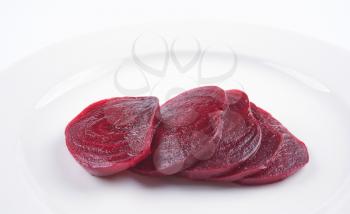 sliced boiled beetroot on a white plate