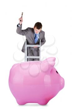 young businessman going to  break the piggy bank isolated on white background