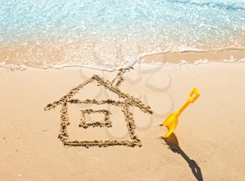 
drawing of a house on the beach - concept safety and vacation