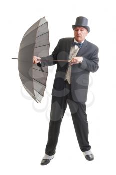Middle aged  businessman in a retro business suit with umbrella isolated on white.