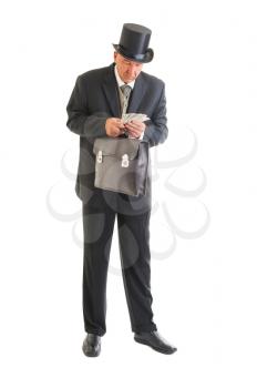 Middle aged  businessman in a retro business suit with money isolated on white.