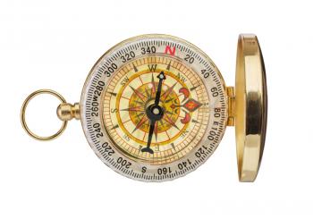Retro brass compass isolated on white background 