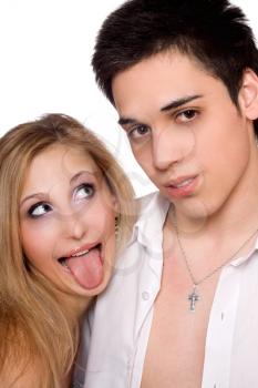 Royalty Free Photo of a Young Man and a Girl With Her Tongue Out