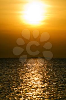 Royalty Free Photo of a Sunset Over Calm Waters