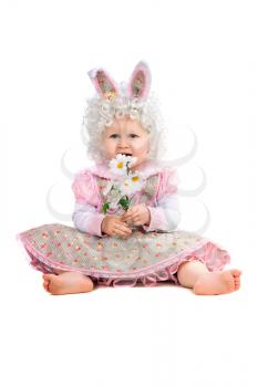 Royalty Free Photo of a Little Girl Wearing Bunny Ears Holding a Flower