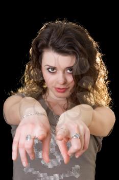Royalty Free Photo of a Girl Pointing With Two Fingers