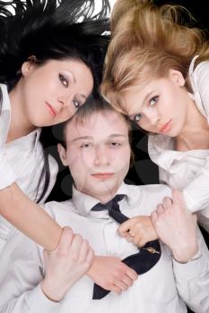 Royalty Free Photo of a Man With Two Women
