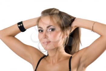 Royalty Free Photo of a Woman With Her Hands in Her Hair
