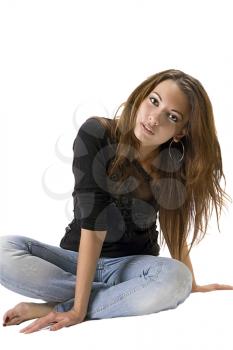 Royalty Free Photo of a Young Woman Sitting Cross Legged