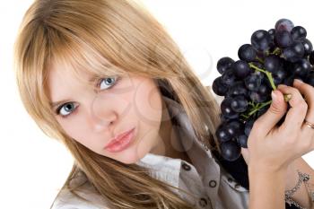 Royalty Free Photo of a Woman With a Cluster of Grapes