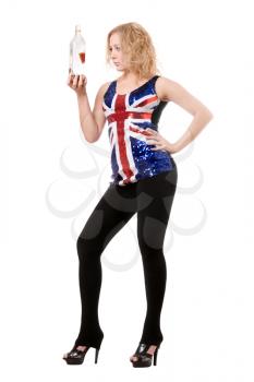Royalty Free Photo of a Woman in a Union Jack Shirt Holding an Empty Bottle