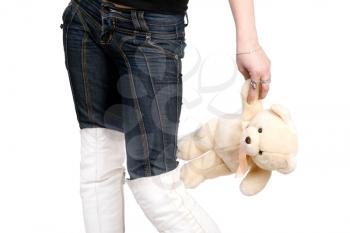 Royalty Free Photo of a Hand Holding a Teddy Bear