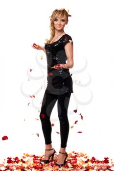 Royalty Free Photo of a Woman Standing in Petals