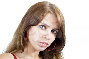 Royalty Free Photo of a Young Woman With Red Earrings