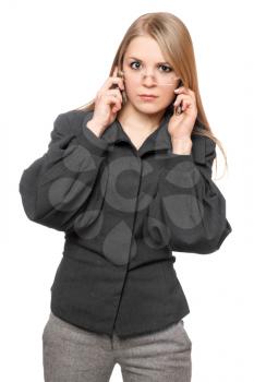 Royalty Free Photo of a Woman in Business Clothes Talking on a Cellphone
