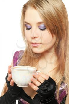 Royalty Free Photo of a Woman Having a Cup of Tea