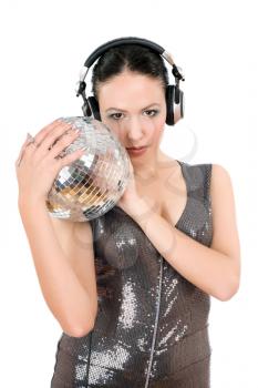 Young woman in headphones with a mirror ball. Isolated on white