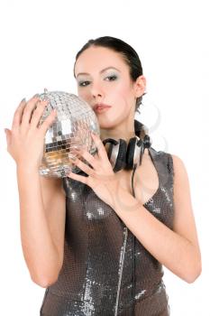Portrait of beautiful young brunette with a mirror ball in her hands. Isolated