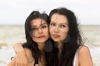 Portrait of a two young women on the beach