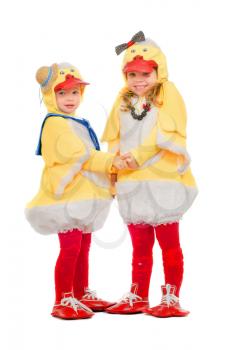 Two small children dressed as ducks. Isolated