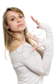 Graceful young blond woman posing in white blouse. Isolated 