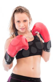 Portrait of nice woman posing in red boxing gloves. Isolated on white